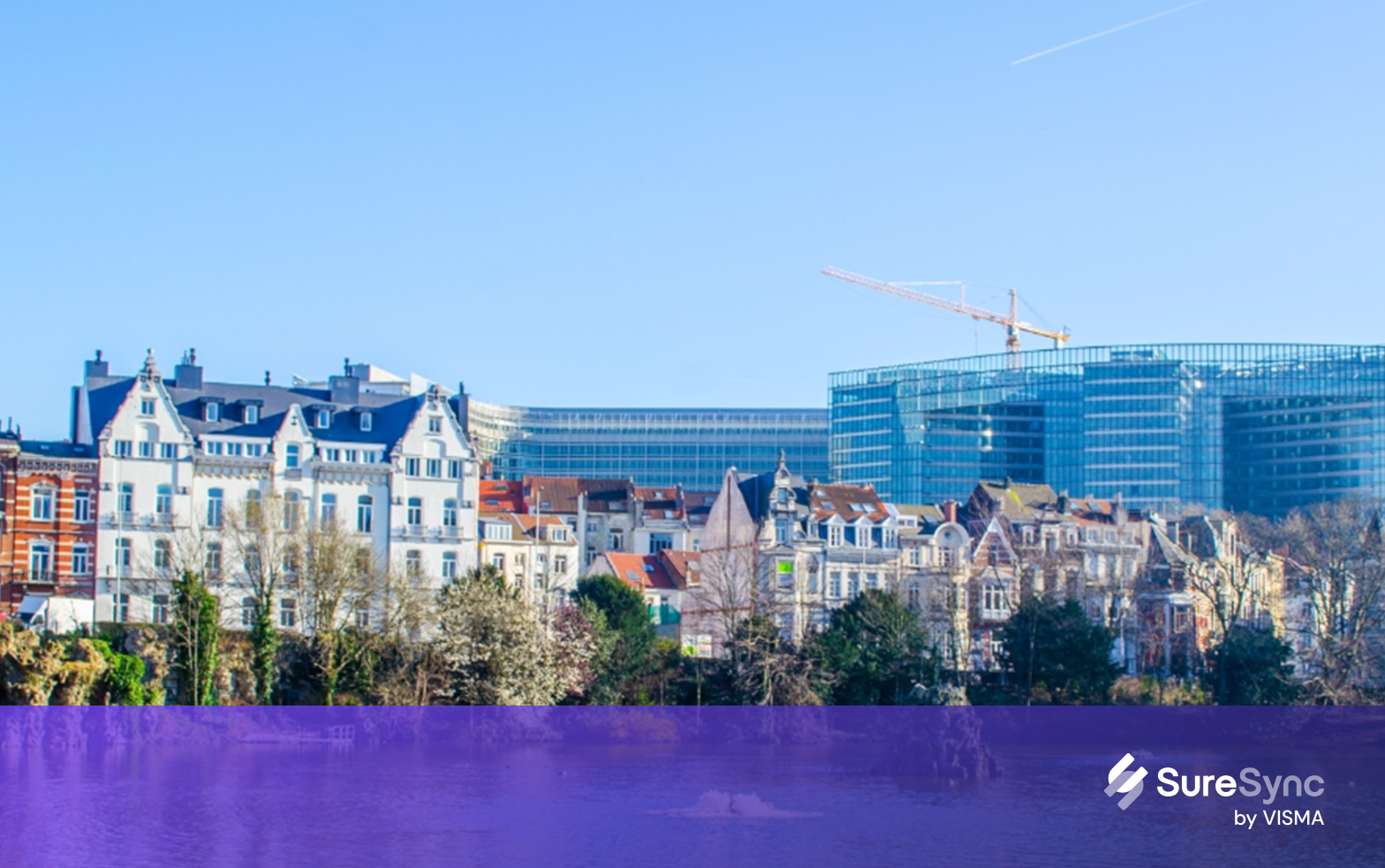 View over the artificial lake with fountain in front of the European commission building in brussels.