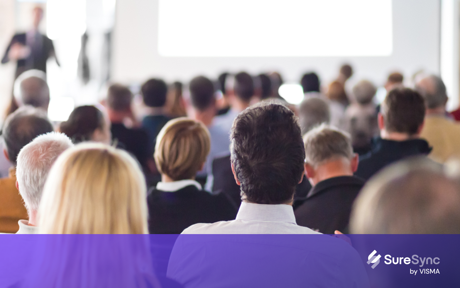 Group of people listening to a conference